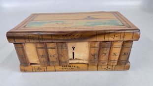 AN OLIVE WOOD BOX DESIGNED AS A ROW OF BOOKS, WITH 'SECRET' COMPARTMENT,