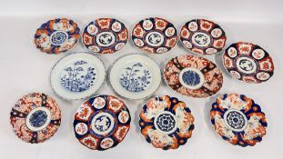 A GROUP OF 10 ASSORTED IMARI PATTERN PLATES A/F + TWO CHINESE BLUE AND WHITE PORCELAIN PLATES A/F.