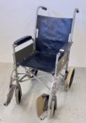 METAL FRAMED WHEELCHAIR.