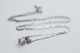 A 9CT WHITE GOLD CHAIN AND DIAMOND PENDANT.
