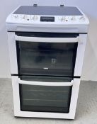 A ZANUSSI SLIM LINE ELECTRIC DOUBLE OVEN SLOT IN COOKER WITH CERAMIC HOB - SOLD AS SEEN.
