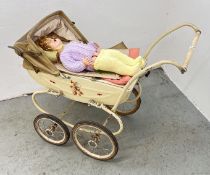 A 1950s COACH BUILT DOLL'S PRAM ALONG WITH TWO VINTAGE COMPOSITE BODY DOLLS.