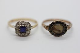 A 9CT GOLD CLUSTER RING AND A VINTAGE UNMARKED MOURNING STYLE RING A/F.