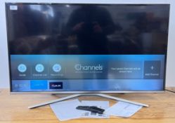 SAMSUNG 40 INCH SMART TELEVISION COMPLETE WITH INSTRUCTIONS AND SMART REMOTE - SOLD AS SEEN.