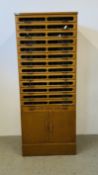 A MID CENTURY MULTI DRAWER HABERDASHERY CABINET WITH TWO DOOR CUPBOARD BASE, W........CM X D........