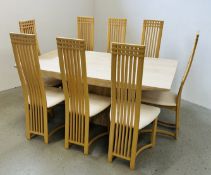 A LARGE AND IMPRESSIVE STONE DINING TABLE ALONG WITH A SET OF 8 HIGH BACK DINING CHAIRS.
