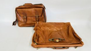 A GOOD QUALITY LEATHER DAKOTA TUMI TRAVEL SUIT BAG AND GOOD QUALITY LEATHER HI DESIGN BAG.
