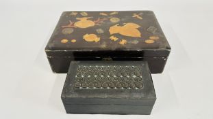 AN ANTIQUE JAPANESE LACQUERED BOX WITH INSET COINS AND A VINTAGE LEATHER BOUND STONE SET BOX.