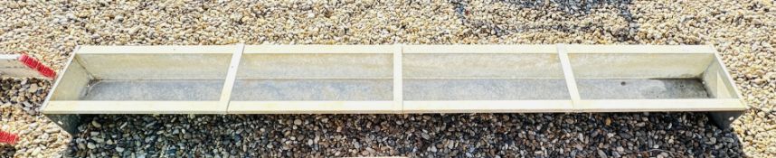 A LONG GALVERNISED TROUGH.