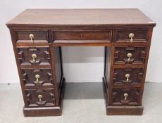 ANTIQUE JACOBEAN STYLE OAK 7 DRAWER KNEEHOLE DESK, W 96, D 49, H 76CM.