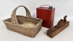 A VINTAGE WICKER BASKET AND A VINTAGE PETROLEUM SPIRIT CAN AND A VINTAGE PLANE.
