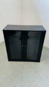 A MODERN GLAZED FRONT BLACK FINISH CABINET.