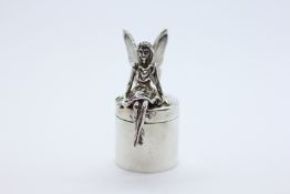 A SILVER FAIRY TRINKET BOX.