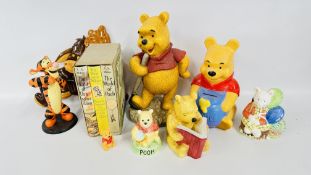 A GROUP OF DISNEY & WINNIE THE POOH COLLECTOR'S FIGURES AND BOOKS.