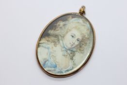 A FRENCH PORTRAIT OF A LADY IN A BLUE DRESS, IN NARROW OVAL YELLOW METAL FRAME, W 4 X H 5.5CM.