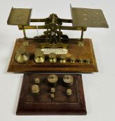 A SET OF ANTIQUE BRASS INLAND LETTER RATES,