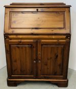PINE BUREAU WITH TWO DOOR CUPBOARD BASE.