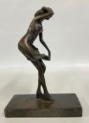 A BRONZE FINISH RESIN MODEL OF A GIRL, HEIGHT 33CM.