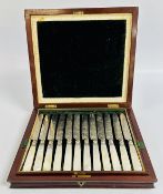 AN ANTIQUE MAHOGANY CASED SET OF SILVER FRUIT CUTLERY,