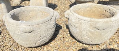 A PAIR OF LARGE STONEWORK TUB PLANTERS DECORATED WITH ACANTHUS LEAVES, HEIGHT 31CM.
