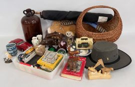 A BOX OF SUNDRIES TO INCLUDE NEEDLE WORK HANGING WALL PANEL, WICKER BASKET, ART GLASS PAPERWEIGHTS,