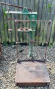 A SET OF VINTAGE C.S. COOPER CAST IRON PLATFORM SCALES.