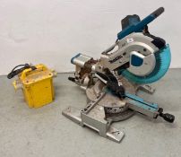 MAKITA DXT SLIDING COMPOUND MITRE SAW (110 VOLT) PLUS 110 VOLT POWER TRANSFORMER - SOLD AS SEEN.