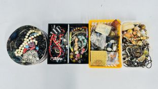 4 BOXES OF COSTUME JEWELLERY WITH NECKLACES, BANGLES AND BEADS ETC.