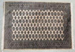 A PAKISTAN BOKARA 244 X 52CM CARPET.