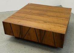 A LARGE DESIGNER SQUARE COFFEE TABLE.