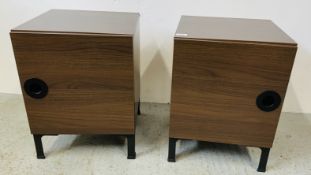 A PAIR OF DESIGNER TWO SINGLE DOOR BEDSIDE CABINETS.