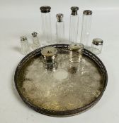 A SILVER PLATED TRAY CONTAINING 8 SILVER AND WHITE METAL TOPPED DRESSING TABLE VANITY JARS AND POT