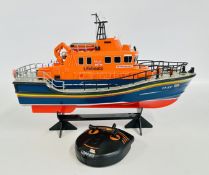 REMOTE CONTROL MODEL OF RNLB VOLUNTEER SPIRIT LIFEBOAT 17-27 ON STAND, 45CM LONG,