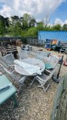 A CIRCULAR SOLID TEAK PATIO TABLE,