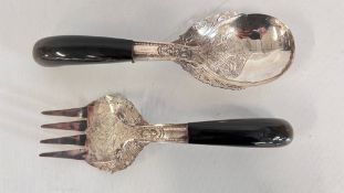 A PAIR OF MALAYAN 'KALATAN' WHITE METAL SERVERS.