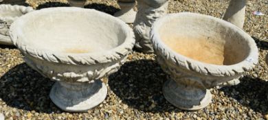 A PAIR OF SHALLOW PEDESTAL GARDEN PLANTERS WITH FOLIAGE DECORATION, DIAMETER 54CM.