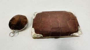 A BIRMINGHAM 1902 SILVER EDGED CROCODILE SKIN CASE BY CHARLES PENNY BROWN AND A SNAKESKIN PURSE.