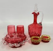 A CRANBERRY GLASS DECANTER AND STOPPER ALONG WITH TWO CRANBERRY BEAKERS A/F,