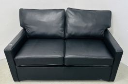 A MODERN BLACK FAUX LEATHER SOFA BED.
