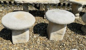 TWO STONEWORK SADDLE STONES, HEIGHT 42CM.