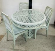 A GREEN PAINTED CIRCULAR PEDESTAL TABLE WITH LATTICE DESIGN TOP AND BASE + 3 CHAIRS IN SIMILAR