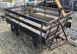 BYGONE FARMYARD CART WITH CAST IRON WHEELS, LENGTH 190CM.