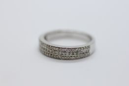 14CT WHITE GOLD HALF HOOP DIAMOND CLUSTER RING.