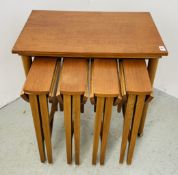A NEST OF MID CENTURY OCCASIONAL TABLES.