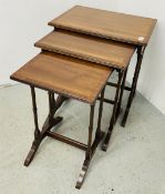 A SET OF THREE GRADUATED GOOD QUALITY REPRODUCTION MAHOGANY OCCASIONAL TABLES.