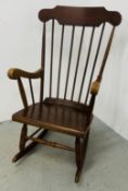 A STICK BACK ROCKING CHAIR.