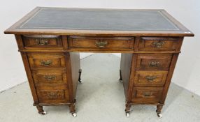 A SMALL VICTORIAN NINE DRAWER KNEEHOLE DESK WITH INSET TOOLED LEATHER TOP, W 108CM, D 56CM, H 74CM.