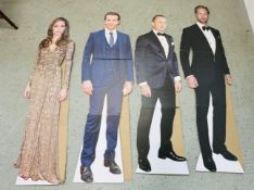 A GROUP OF 4 6FT CARDBOARD CUT OUTS.
