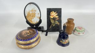 A TURNED OLIVE WOOD VASE AND COVER CONTAINING A SEALED WATER BOTTLE WITH WATER FROM THE JORDAN,