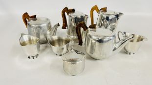 TWO MID CENTURY 4 PIECE PICQUOT WARE TEA AND COFFEE SETS.